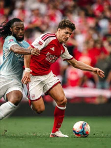 Christos Tzolis in action for Arsenal against Man City